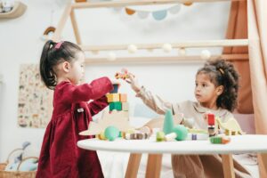 Children are learning how to share with friends at Fireflies Early Learning
